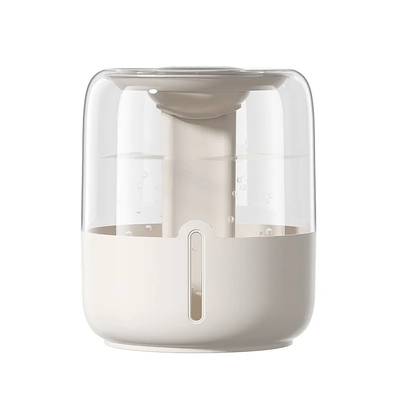 Beige round USB humidifier with display screen and dual mist outlets on a table