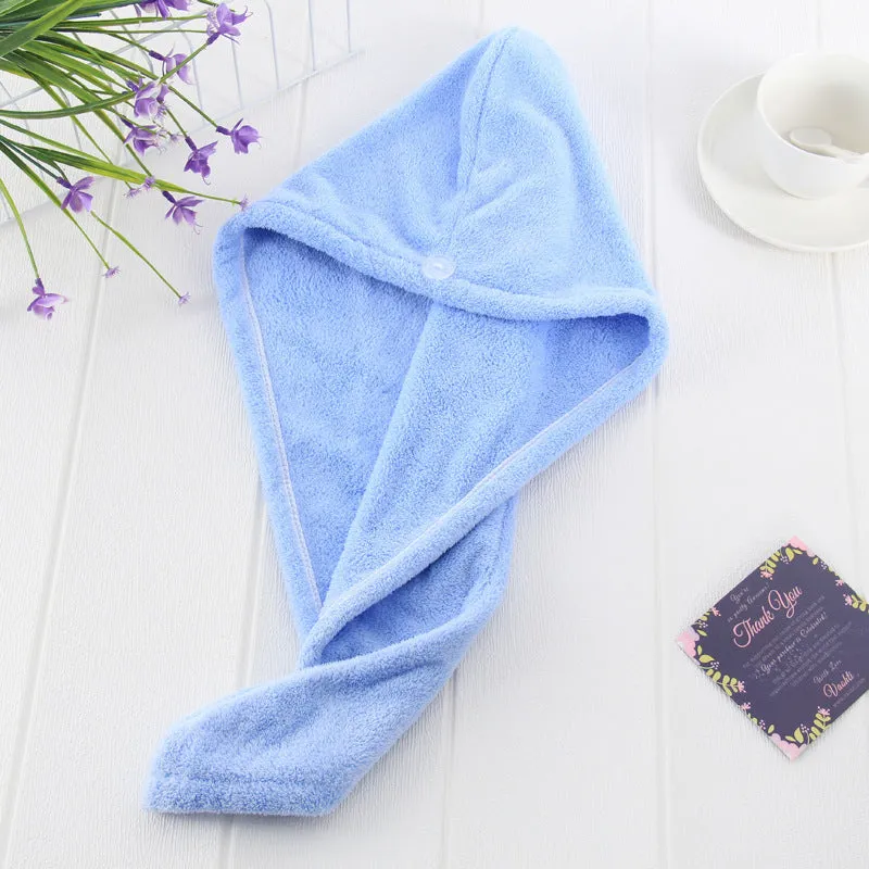 Magic microfiber hair drying towel in pink with button fastening, measuring 25x65cm