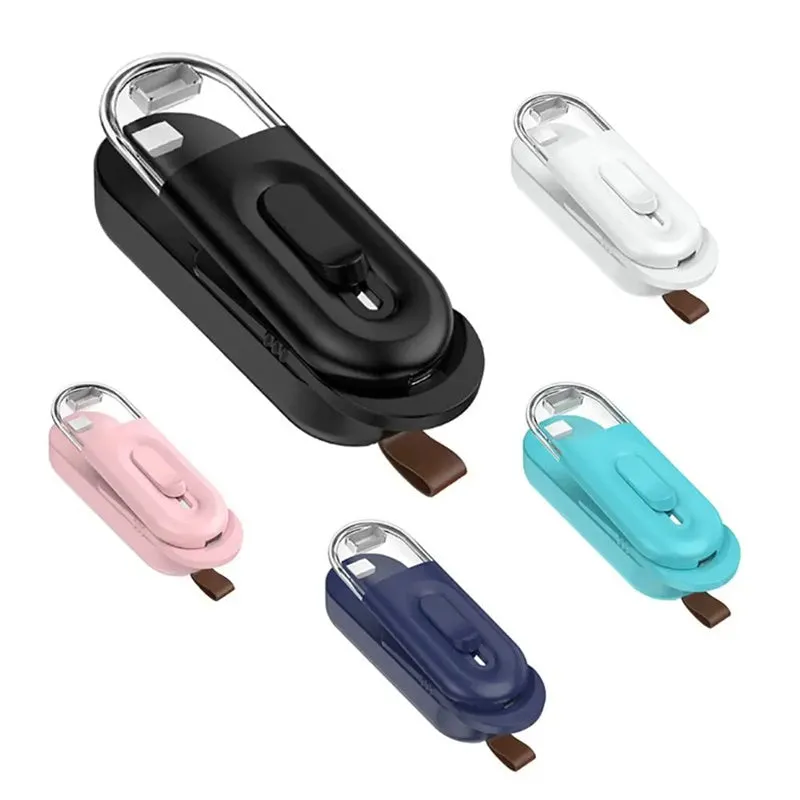 Multi-functional handheld portable food storage bag sealer with cutting head in black, white, and lake blue