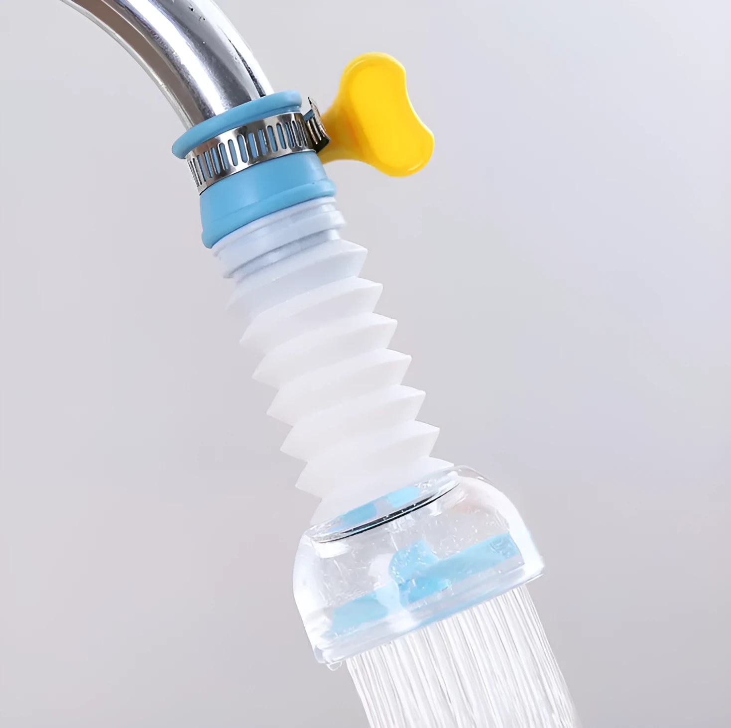 Universal rotating water filter for kitchen faucet with blue colour and 360 degree spray head