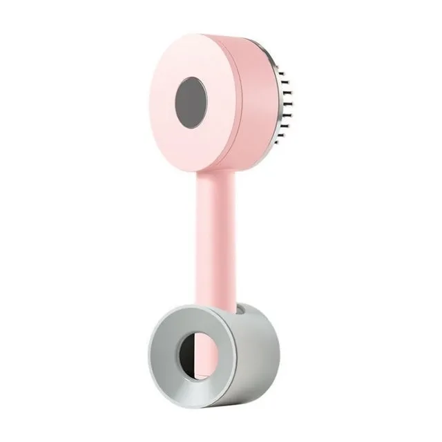 Plastic air cushion comb with long handle in white, green, and pink colours for hair detangling and styling