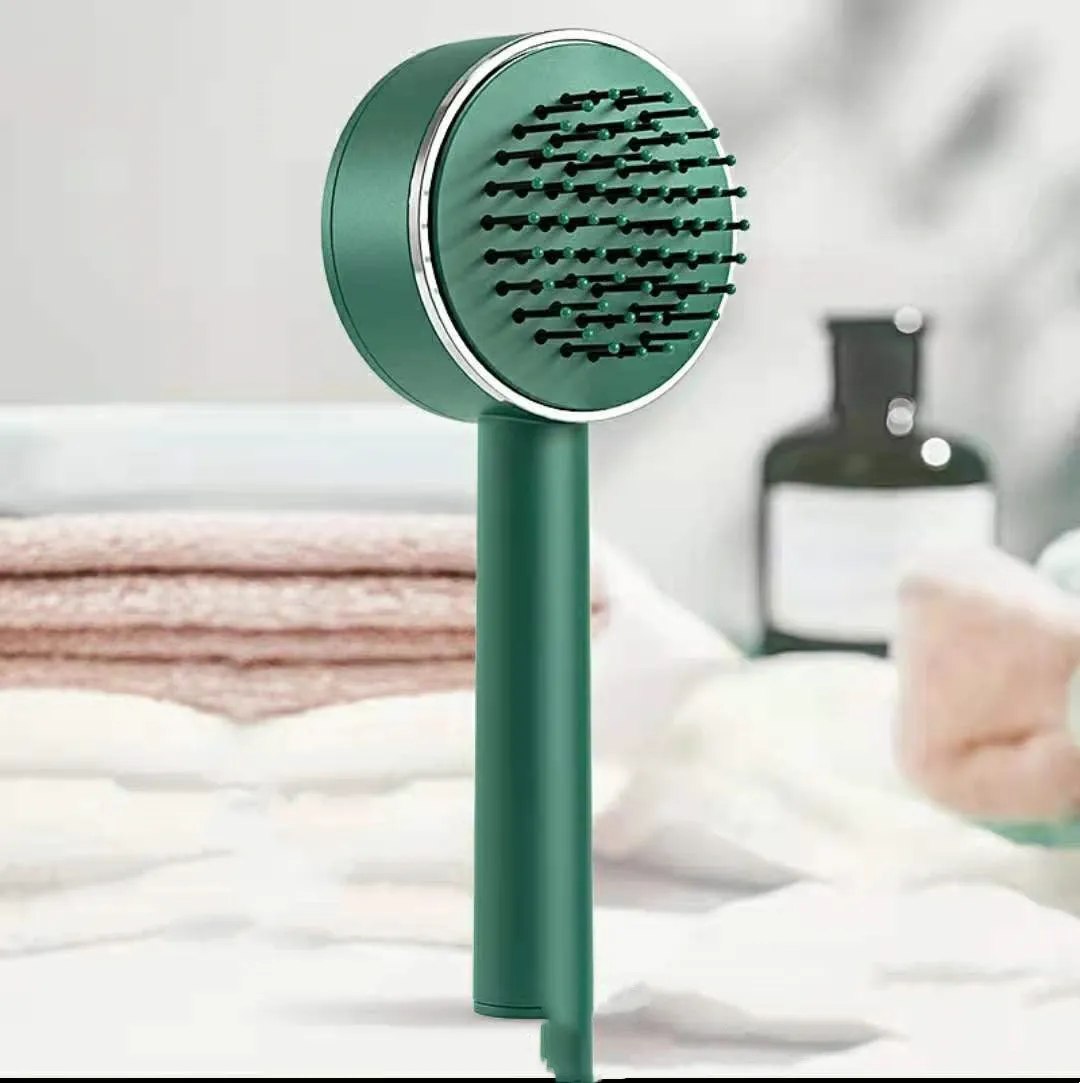 Plastic air cushion comb with long handle in white, green, and pink colours for hair detangling and styling