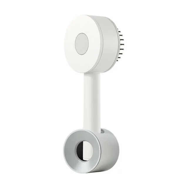 Plastic air cushion comb with long handle in white, green, and pink colours for hair detangling and styling