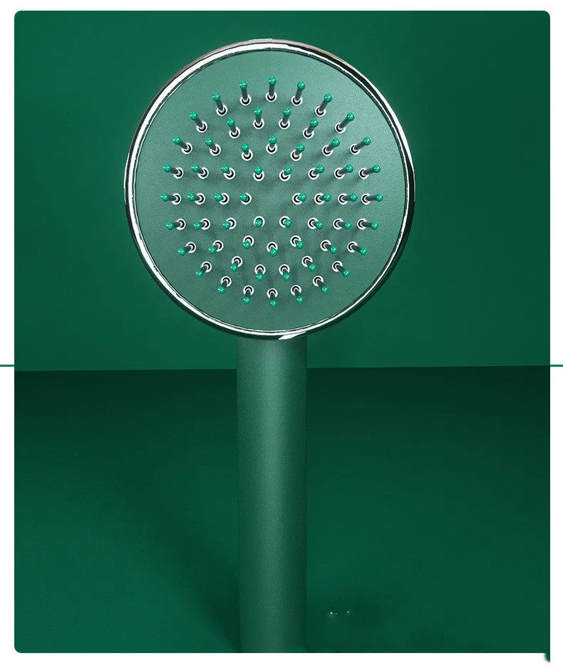 Plastic air cushion comb with long handle in white, green, and pink colours for hair detangling and styling