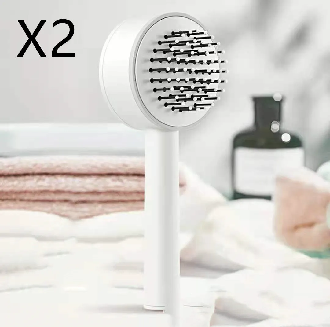 Plastic air cushion comb with long handle in white, green, and pink colours for hair detangling and styling