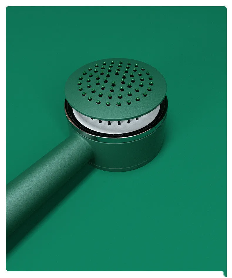 Plastic air cushion comb with long handle in white, green, and pink colours for hair detangling and styling