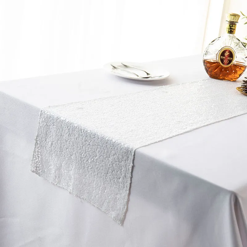 Gypsophila embroidered sequined polyester table runner in beige showing floral pattern and sequin detailing