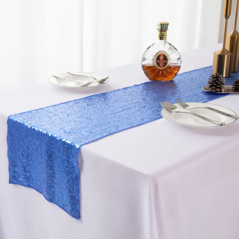 Gypsophila embroidered sequined polyester table runner in beige showing floral pattern and sequin detailing