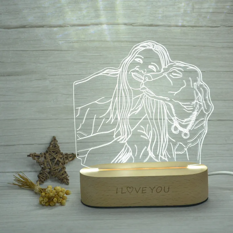 Custom photo 3D stereo night light with acrylic shade on a desk, displaying a clear portrait with soft glow