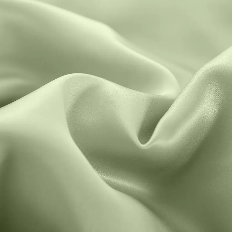 Silk duvet cover in lotus pink showing double-sided construction and plain weave texture