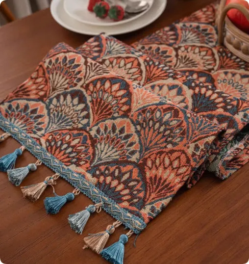 European retro style long table flag with handwoven tassels draped over a wooden sideboard