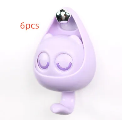 Cream white cat-shaped adhesive wall hook with winking eyes, 2.5kg capacity, 105x61x45mm