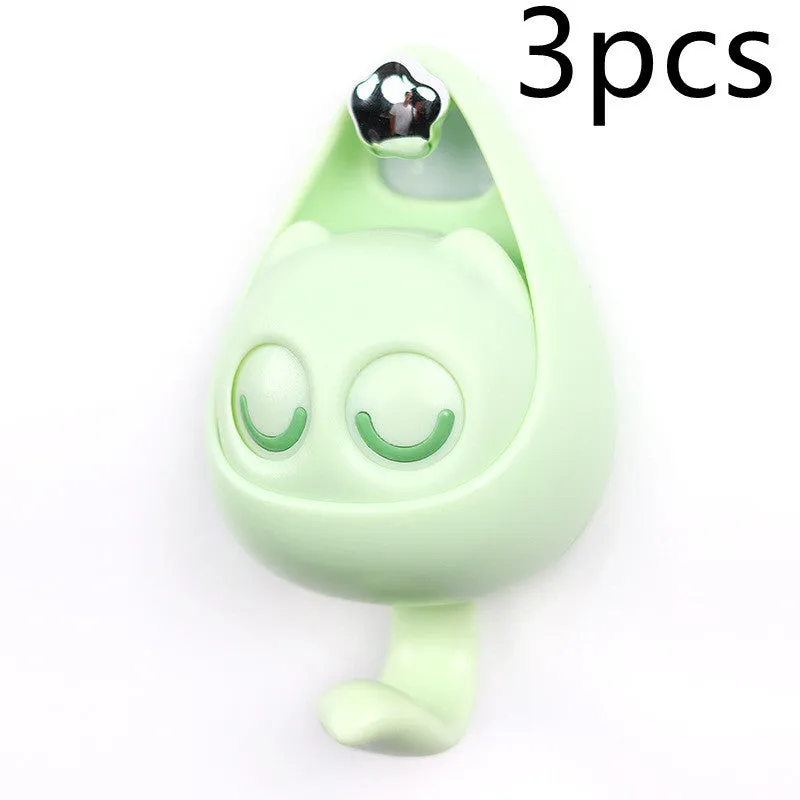 Cream white cat-shaped adhesive wall hook with winking eyes, 2.5kg capacity, 105x61x45mm