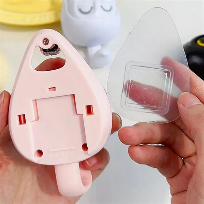 Cream white cat-shaped adhesive wall hook with winking eyes, 2.5kg capacity, 105x61x45mm