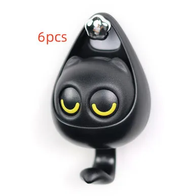 Cream white cat-shaped adhesive wall hook with winking eyes, 2.5kg capacity, 105x61x45mm
