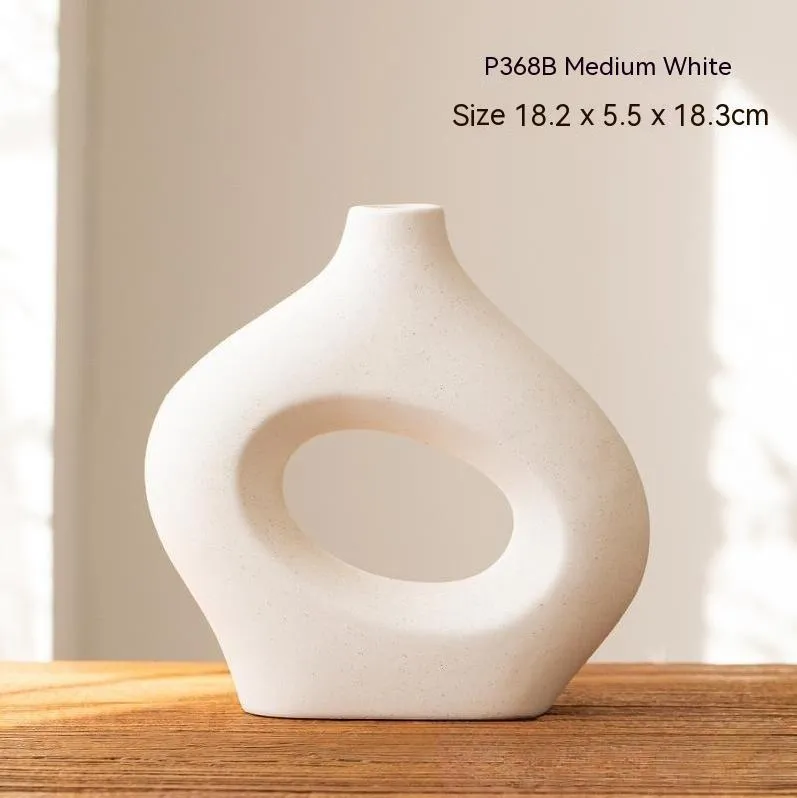 Ceramic soft vase second generation, handmade glazed, white large size on a table as decorative centrepiece