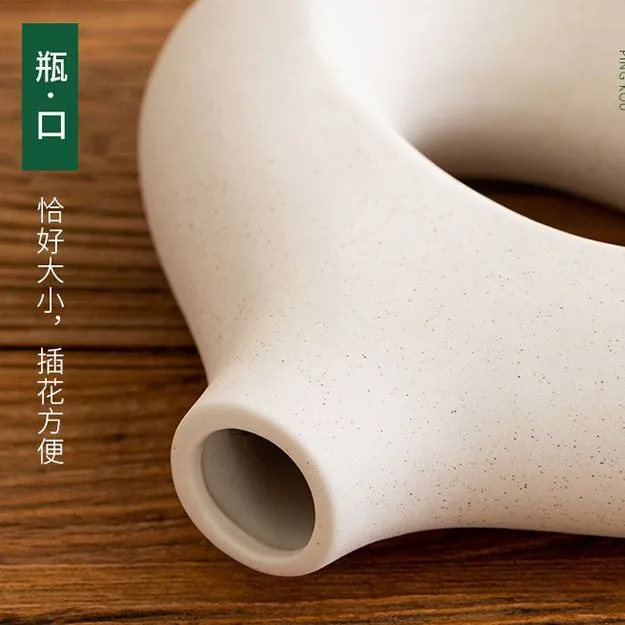 Ceramic soft vase second generation, handmade glazed, white large size on a table as decorative centrepiece