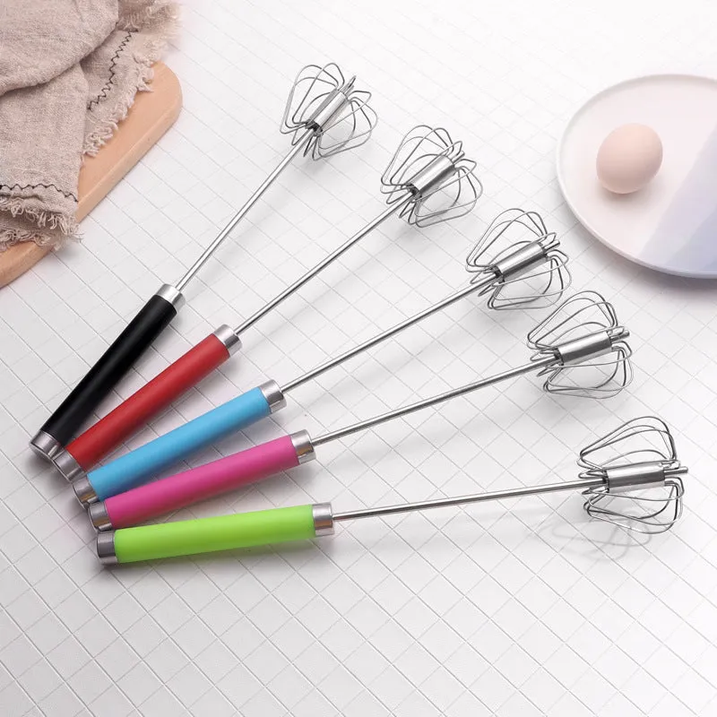 Self spinning whisk with stainless steel head and black handle on white background
