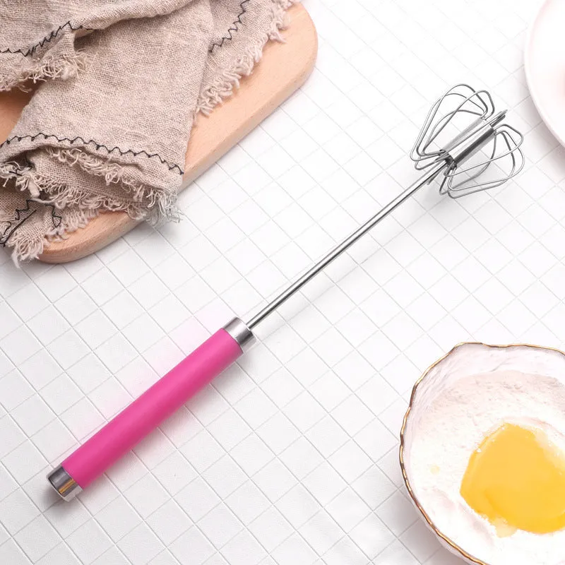 Self spinning whisk with stainless steel head and black handle on white background