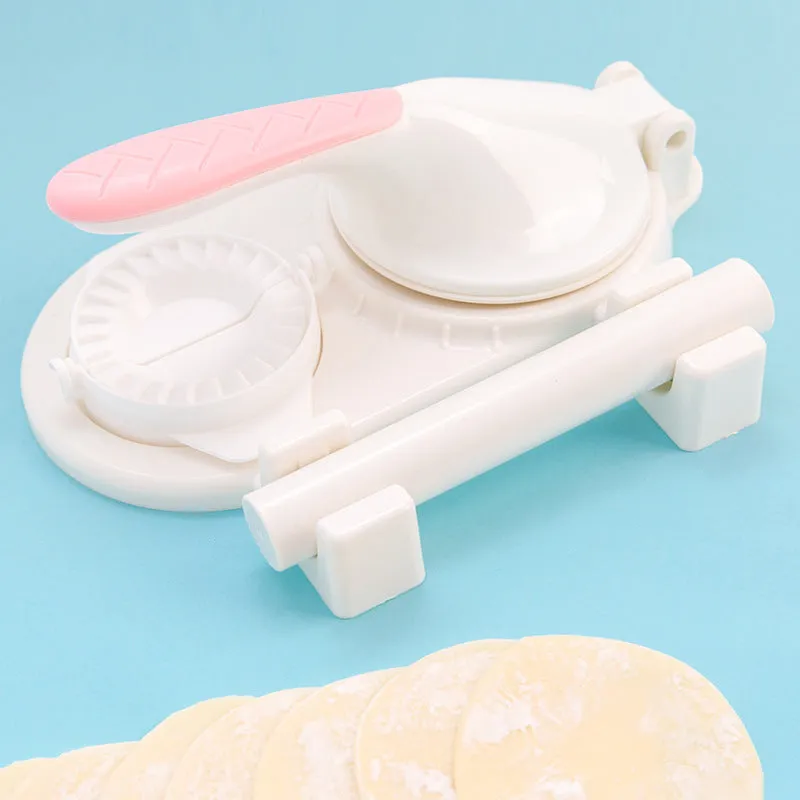 3 In 1 plastic dumpling maker with rolling pin and moulds, green colour, on kitchen countertop