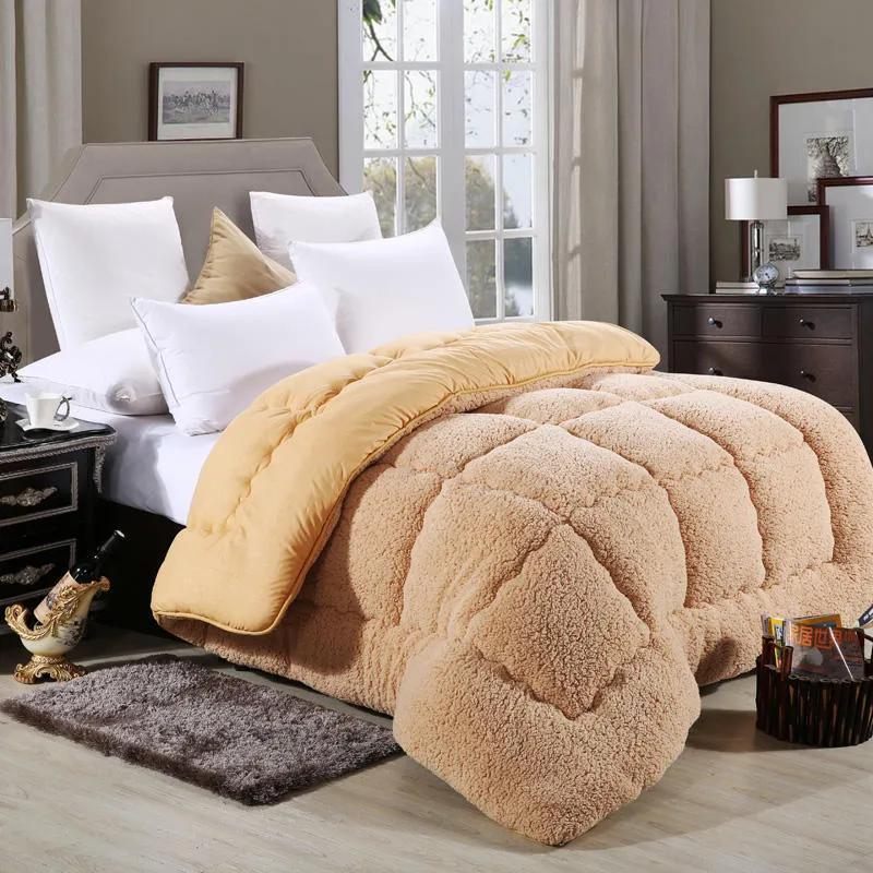 Goose down quilt with polyester shell in neutral colour, available in multiple sizes up to 220x240cm