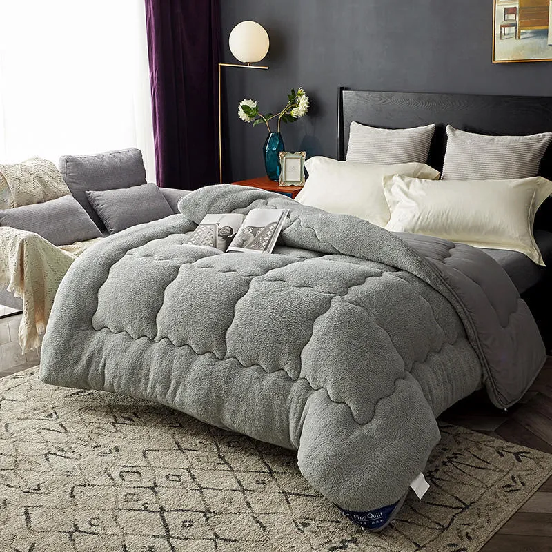 Goose down quilt with polyester shell in neutral colour, available in multiple sizes up to 220x240cm