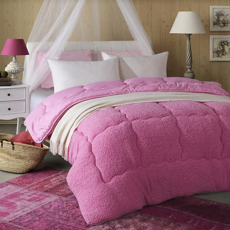 Goose down quilt with polyester shell in neutral colour, available in multiple sizes up to 220x240cm