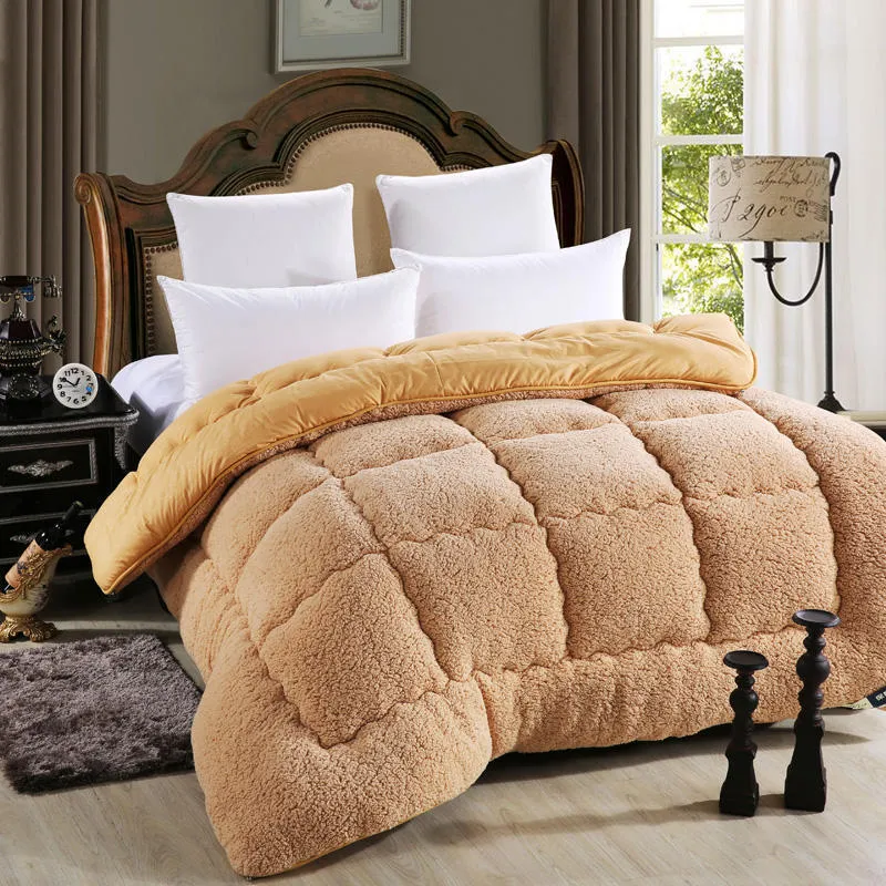 Goose down quilt with polyester shell in neutral colour, available in multiple sizes up to 220x240cm