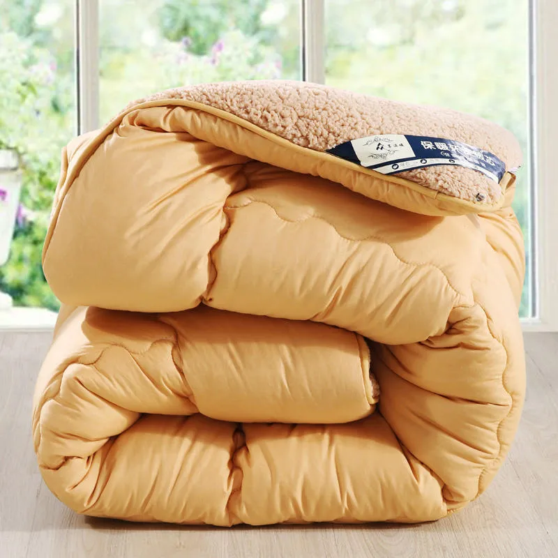Goose down quilt with polyester shell in neutral colour, available in multiple sizes up to 220x240cm