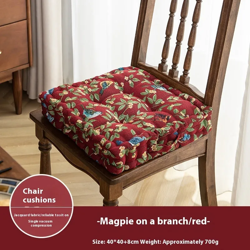 Square American-style dining chair cushion with pp cotton filler, shown in apricot floral bird print.