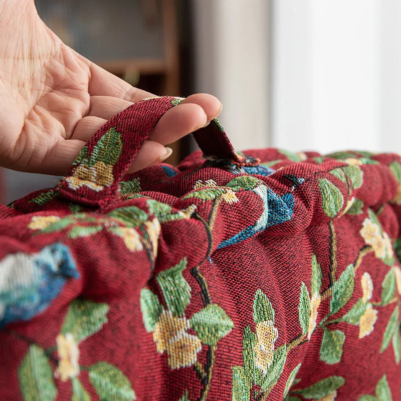 Square American-style dining chair cushion with pp cotton filler, shown in apricot floral bird print.