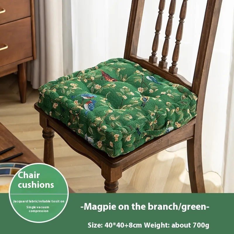 Square American-style dining chair cushion with pp cotton filler, shown in apricot floral bird print.