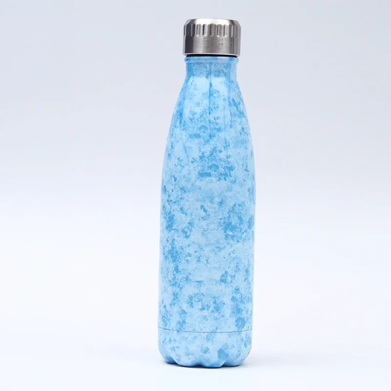500ml stainless steel vacuum insulated sport bottle with lid on a gym bench