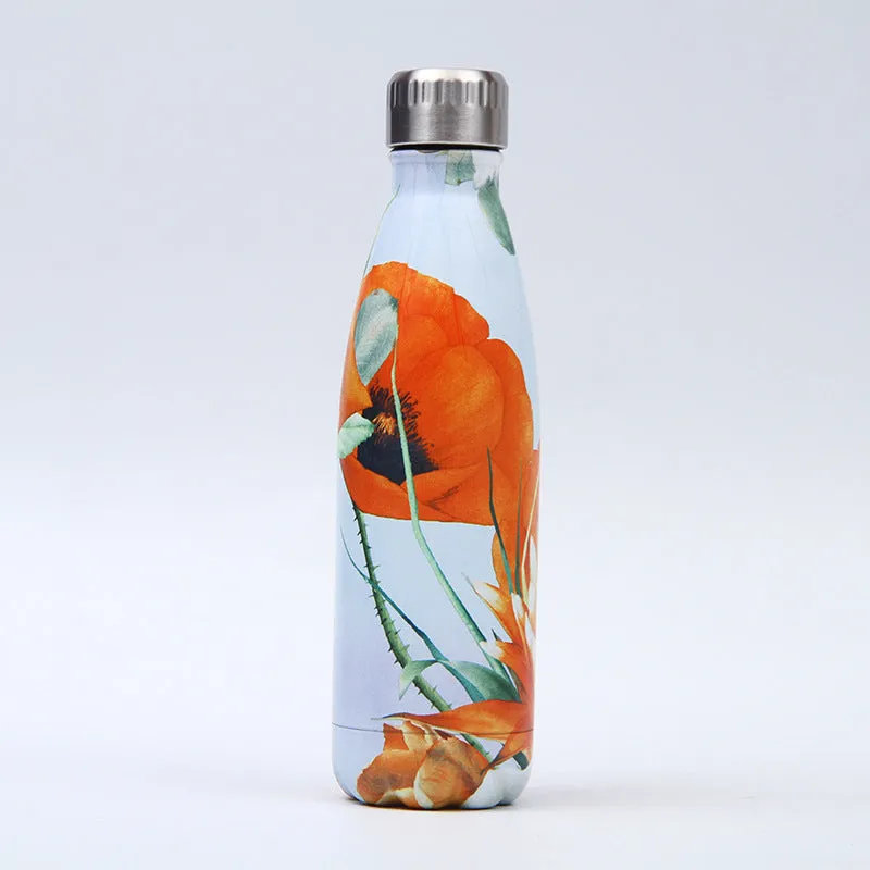 500ml stainless steel vacuum insulated sport bottle with lid on a gym bench