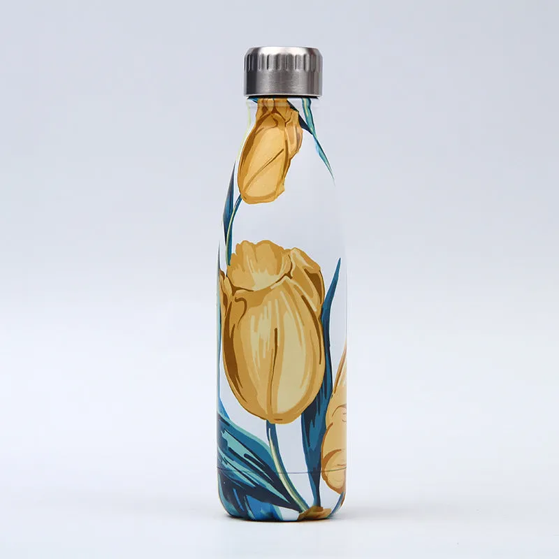 500ml stainless steel vacuum insulated sport bottle with lid on a gym bench