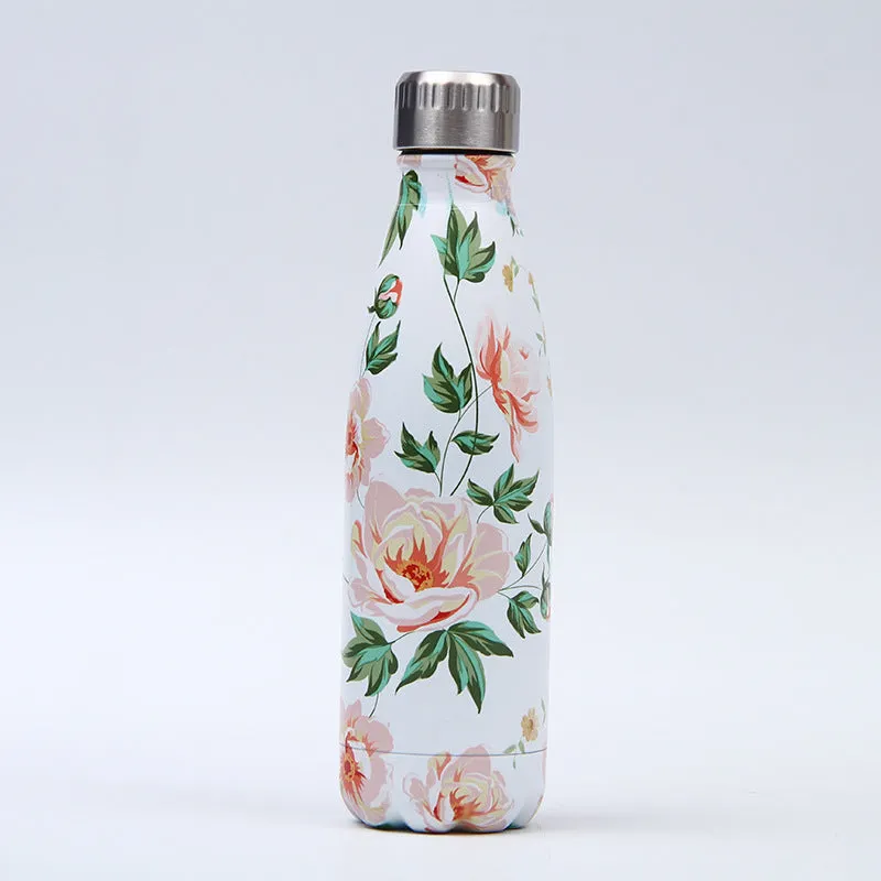 500ml stainless steel vacuum insulated sport bottle with lid on a gym bench