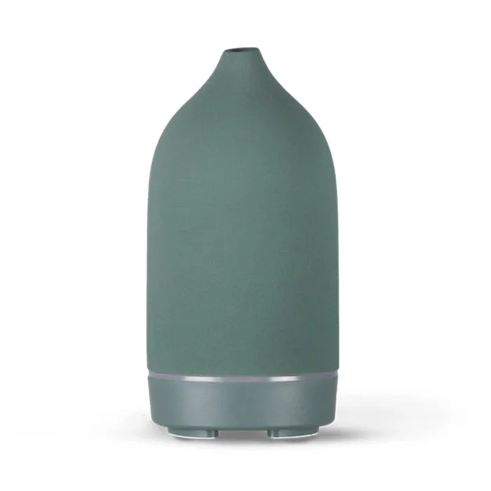 Ceramic aroma diffuser humidifier with 160ml tank, white ceramic finish, single mist outlet, on a wooden table.