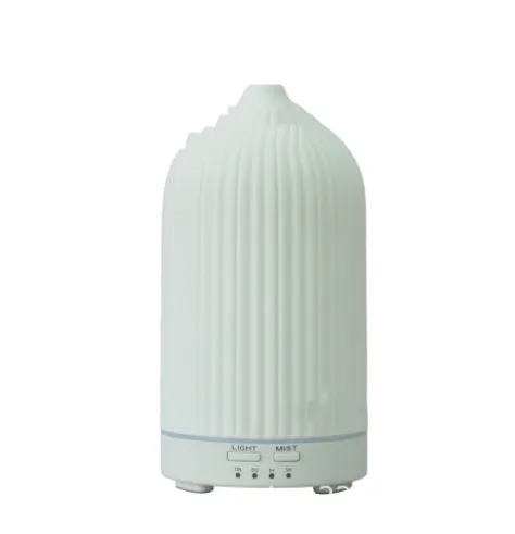 Ceramic aroma diffuser humidifier with 160ml tank, white ceramic finish, single mist outlet, on a wooden table.