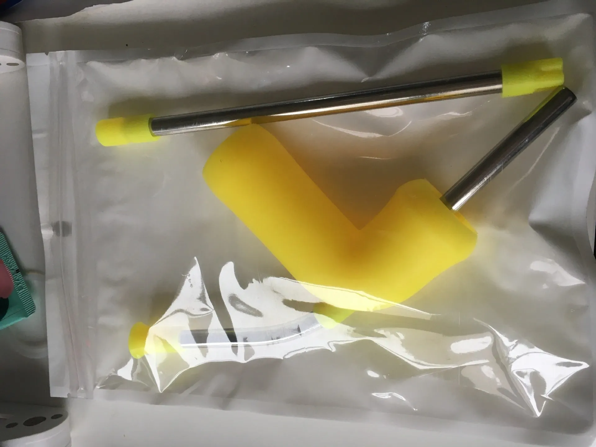 Beer snorkel straw in rose red, blue, and yellow for fast bottle drinking