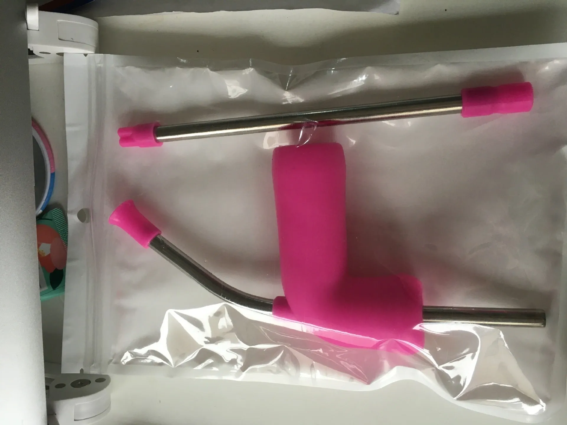Beer snorkel straw in rose red, blue, and yellow for fast bottle drinking