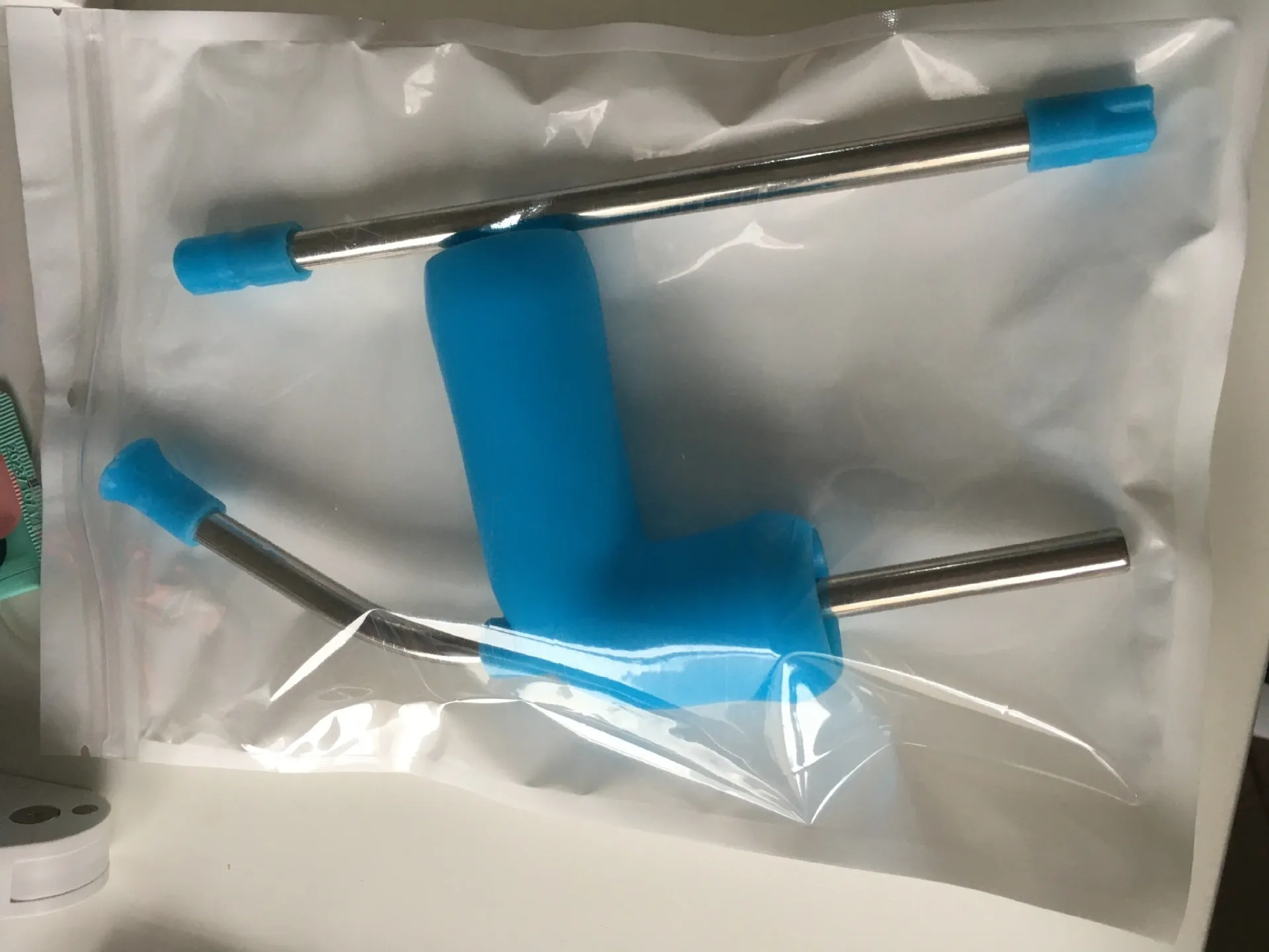 Beer snorkel straw in rose red, blue, and yellow for fast bottle drinking