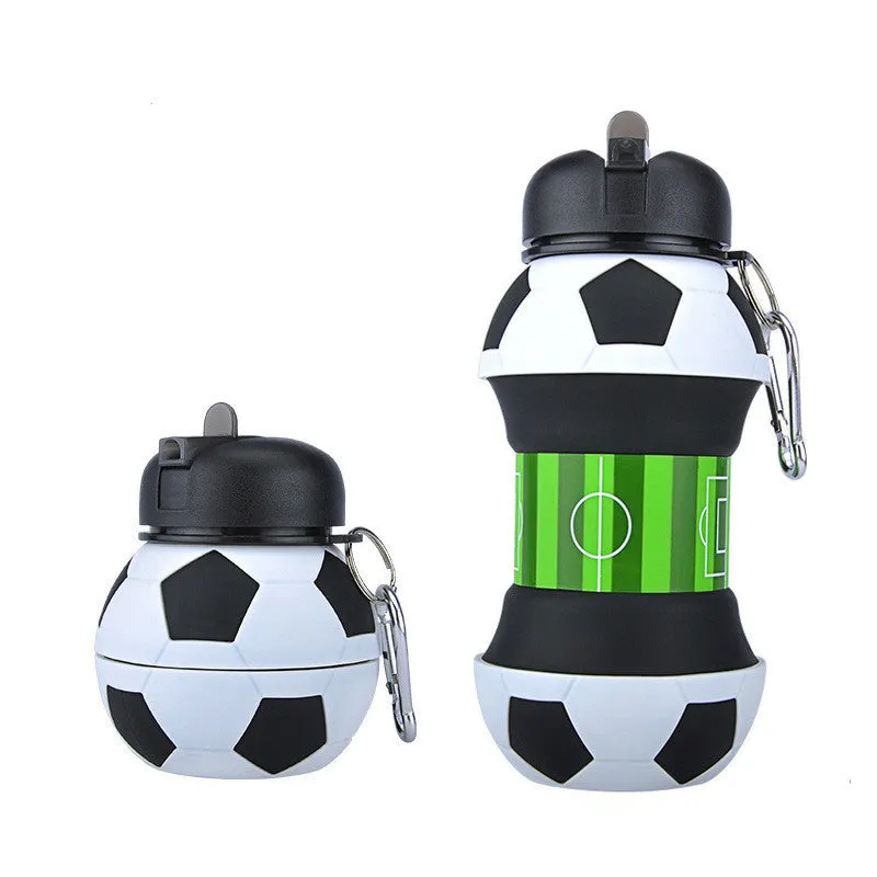 Collapsible white soccer ball shaped silicone water bottle with straw and carrying clip, 18 oz capacity