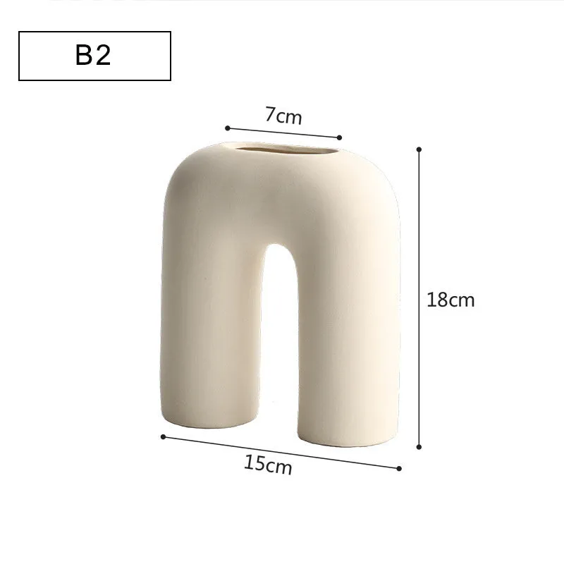 Modern minimalist geometric ceramic vase with painted surface in style A