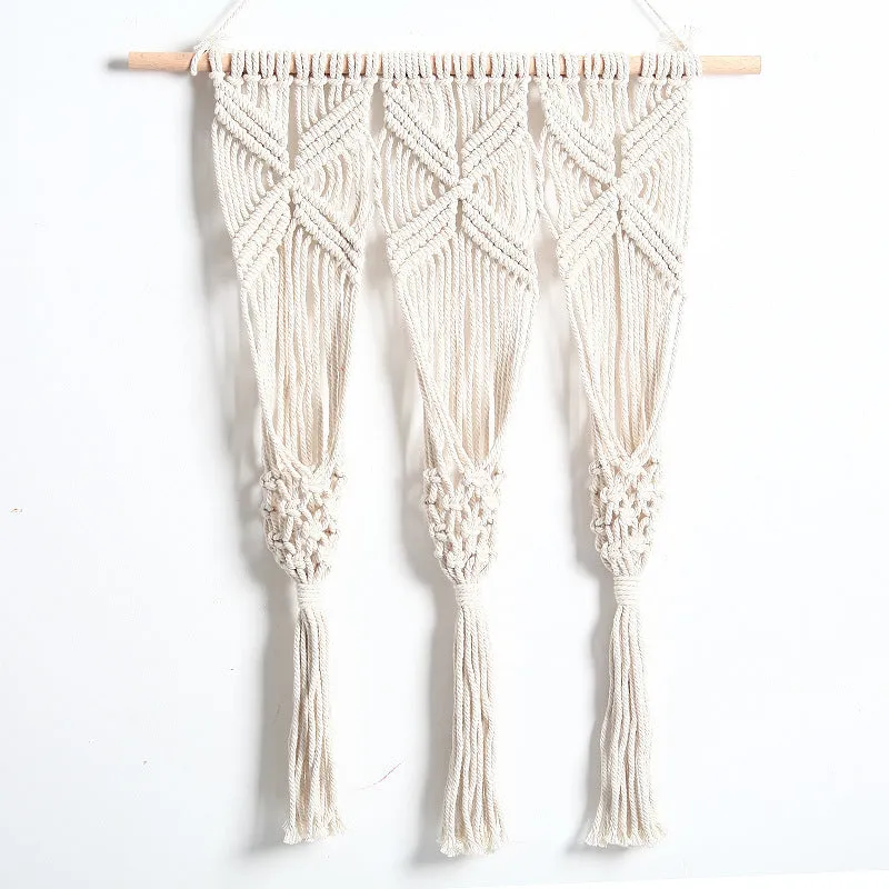 White hand-woven cotton rectangle tapestry 50x65cm with beech rod hung on wall showing grid pattern
