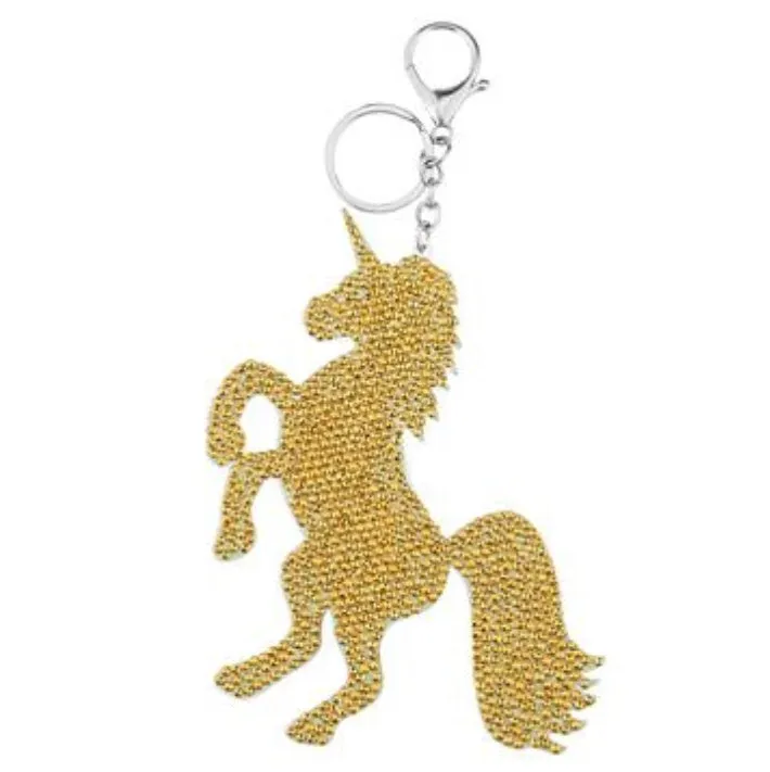 Diamond painting keychain craft kit with four style options: ladybird, Santa Claus, unicorn, on a white background