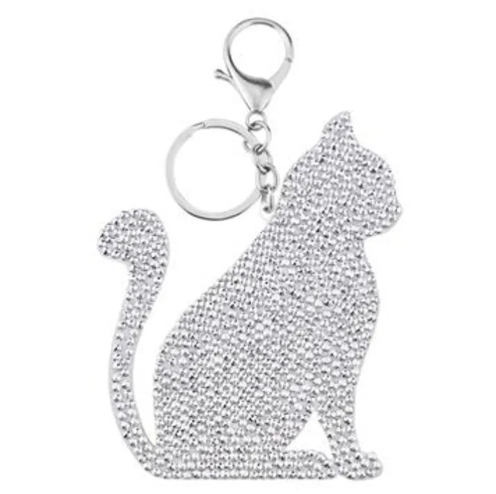Diamond painting keychain craft kit with four style options: ladybird, Santa Claus, unicorn, on a white background