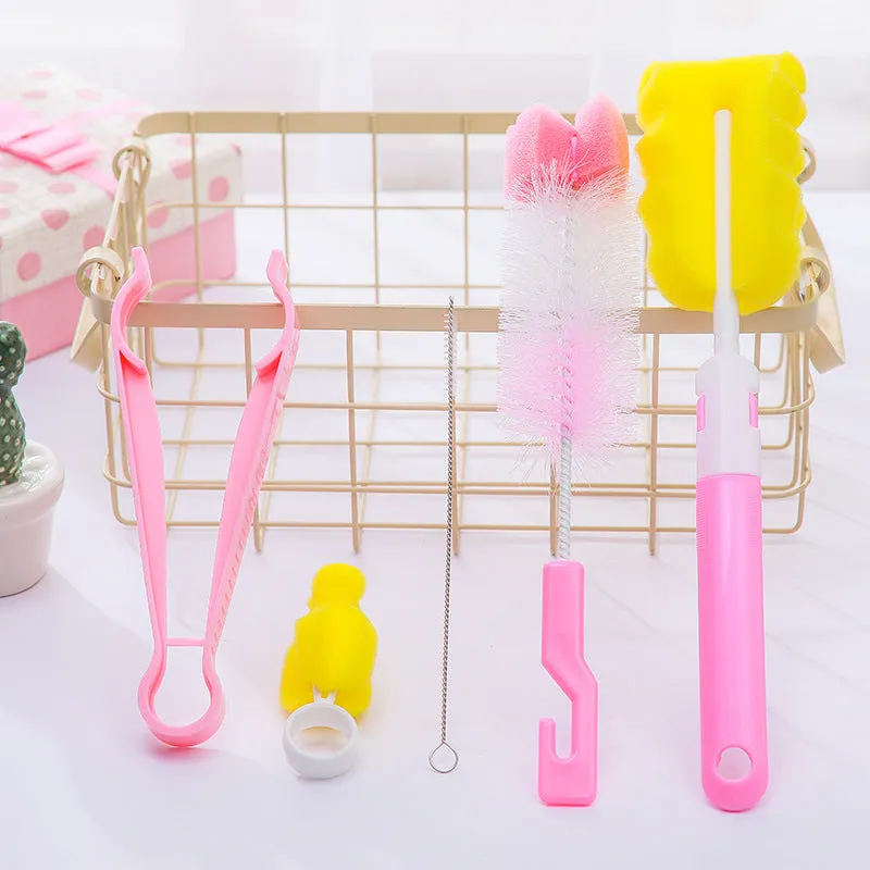 Orange Belle seven-piece bottle brush set in blue and pink includes sponge brush, nylon brush, nipple brushes, straw brushes, and bottle holder