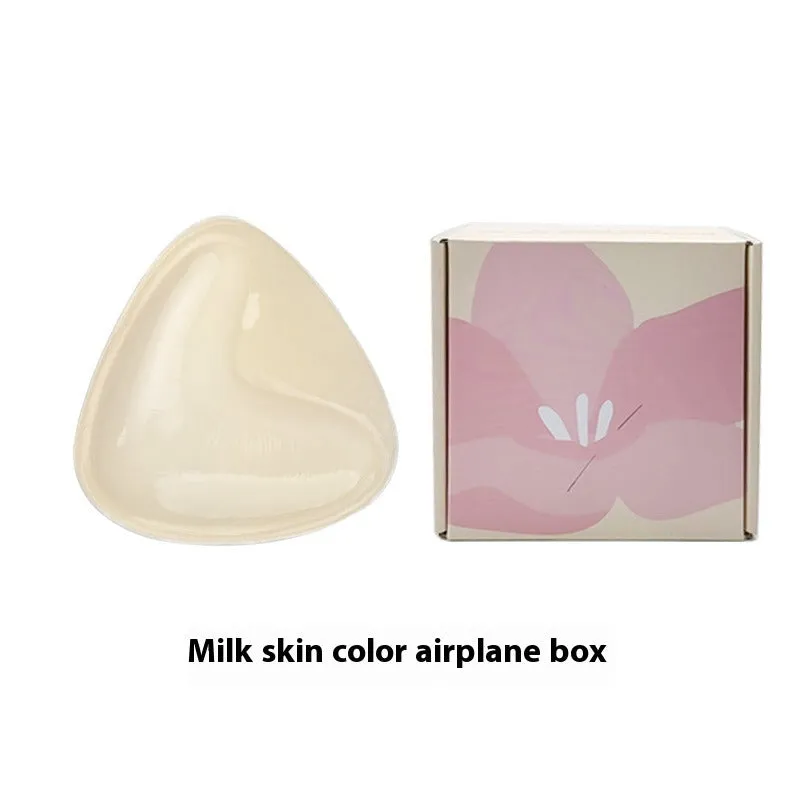 Double sided adhesive silicone bra inserts for push up lift in nude shades, reusable and water resistant