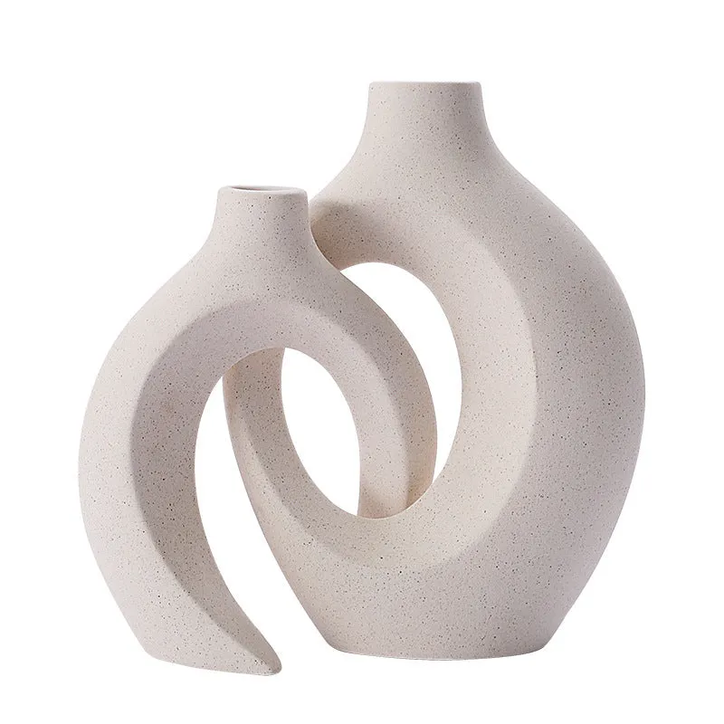 Two glazed ceramic vases in snuggle colour set for home decoration