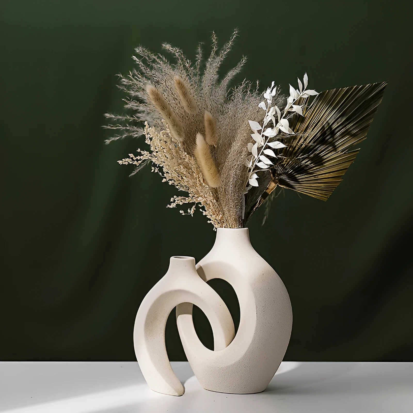 Two glazed ceramic vases in snuggle colour set for home decoration